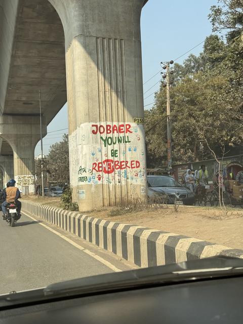 Viaduct pillar mural reading ‘Jobaer you will be remembered’